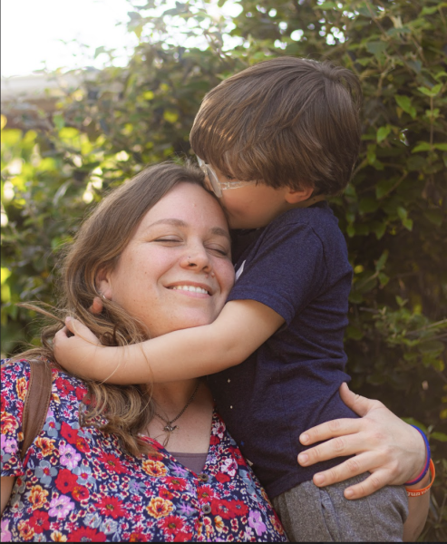 Sarah Podrasky and her son enjoying an embrace.